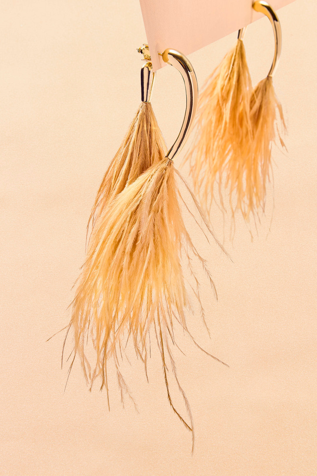 Brinco Levium com Pluma