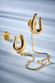 Brinco Delicata P dourado – formas orgânicas com corrente removível e design delicado contemporâneo