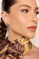brinco estrela, brinco dourado, brinco prateado, brinco bicolor, brinco geométrico, brinco facetado, brinco moderno, brinco sofisticado, brinco de pino, joia com estrela, brinco celestial, brinco elegante, acessório fashion, joia contemporânea, brinco para festa