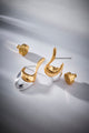 Brinco Fluire em metal nobre, banho ouro 18k e prata 1.000 – acabamento bimetal polido