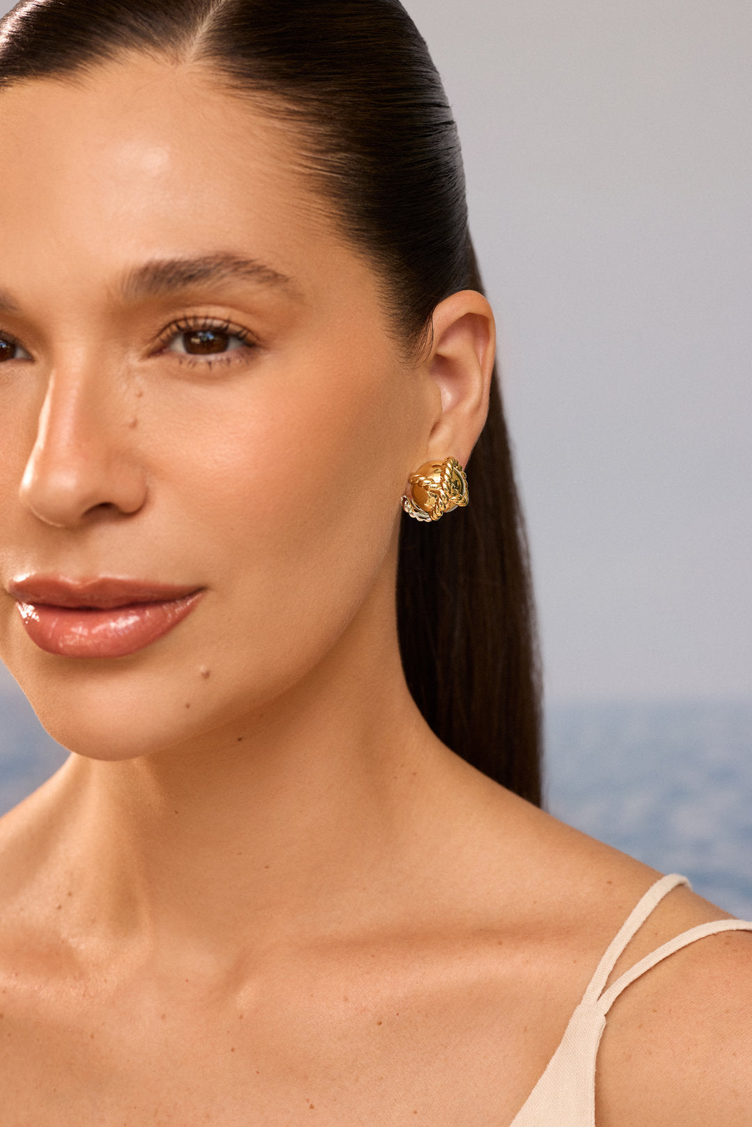 Brinco Laço do Mar Dourado com Prata