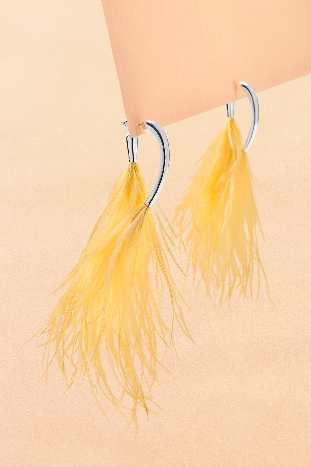 Brinco Levium com Pluma